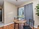 Charming dining area featuring wood floors and sliding glass door at 10901 Carmel Crossing Rd, Charlotte, NC 28226