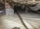 Clean crawlspace with vapor barrier, ductwork, and support beams for a dry and stable foundation at 1232 Bilmark Ave, Charlotte, NC 28213