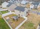 Aerial view of a fenced-in backyard with a grill, gazebo and small storage shed at 1301 Waylon Ave, Gastonia, NC 28054