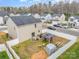 Aerial view of backyard featuring a gazebo, grill, shed, privacy fence, and a patio set at 1301 Waylon Ave, Gastonia, NC 28054