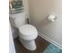 Clean half bathroom with a modern toilet and wood-look flooring at 1301 Waylon Ave, Gastonia, NC 28054