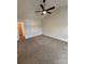 Large bedroom featuring neutral carpeting, a vaulted ceiling, and a walk-in closet at 1301 Waylon Ave, Gastonia, NC 28054