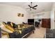 Spacious bedroom featuring a ceiling fan, TV, and desk area, perfect for comfort and productivity at 1301 Waylon Ave, Gastonia, NC 28054