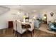 Open-concept dining area leading to a sunny living room, perfect for entertaining and Gathering gatherings at 1301 Waylon Ave, Gastonia, NC 28054