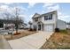 Suburban two-story home featuring an attached garage, driveway, and manicured lawn in a residential neighborhood at 1301 Waylon Ave, Gastonia, NC 28054