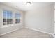 Bedroom with carpet flooring, natural light from windows, and neutral wall color at 136 Ridge Bluff Rd, Mooresville, NC 28115