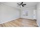 Cozy living room with ample space, modern flooring, and lots of light at 136 Ridge Bluff Rd, Mooresville, NC 28115