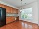 Dining area with hardwood floors, updated light fixtures, and ample natural light at 14309 Stonewater Ct, Fort Mill, SC 29707