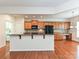 Eat-in kitchen with stainless steel appliances, granite countertops, and ample cabinet space at 14309 Stonewater Ct, Fort Mill, SC 29707