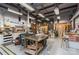 A well-equipped workshop featuring workbenches, tools, and ample space for DIY projects and hobbies at 14309 Stonewater Ct, Fort Mill, SC 29707