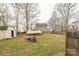 Large backyard with a shed and a boat on a trailer, showcasing outdoor space at 1611 Old Hickory Grove Rd, Mount Holly, NC 28120