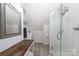 Bathroom with glass shower, white subway tile, and stylish vanity at 1611 Old Hickory Grove Rd, Mount Holly, NC 28120