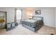 Bedroom with a neutral color palette, window, and a comfortable bed at 1611 Old Hickory Grove Rd, Mount Holly, NC 28120