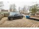 View of the driveway with a black SUV parked next to a portable storage unit, enhancing curb appeal at 1611 Old Hickory Grove Rd, Mount Holly, NC 28120