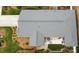 Aerial view of a building with a patio and lush landscaping at 16116 Lakeside Loop Ln, Cornelius, NC 28031