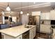 Spacious kitchen island with stainless steel appliances and ample cabinet space at 16116 Lakeside Loop Ln, Cornelius, NC 28031