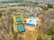 Aerial view of community amenities, including pool, tennis courts, walking trails, and recreation areas at 1660 Sassafras Ct, Fort Mill, SC 29715