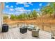 Inviting wooden deck features cozy patio furniture and a grill, perfect for entertaining and relaxation at 1660 Sassafras Ct, Fort Mill, SC 29715