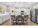 Well-lit kitchen with a central island, pendant lighting, and stainless steel appliances at 1660 Sassafras Ct, Fort Mill, SC 29715