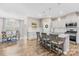 Open concept kitchen and dining area with island seating, stainless appliances and lots of light at 1660 Sassafras Ct, Fort Mill, SC 29715