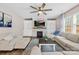 Cozy living room featuring a fireplace, built-in shelves, and comfortable seating at 1660 Sassafras Ct, Fort Mill, SC 29715