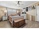 Cozy bedroom with neutral decor, laminate flooring, and natural light from the window at 170 Louise Dr, Mooresville, NC 28115