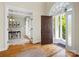 Spacious foyer with hardwood floors and an open view into the adjacent home office at 1708 Meadow Crest Ct, Matthews, NC 28104