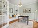 Stylish home office featuring custom built-ins and cozy window seating at 1708 Meadow Crest Ct, Matthews, NC 28104