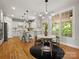 Bright kitchen and eat-in area features modern lighting, an island, and stainless steel appliances at 1708 Meadow Crest Ct, Matthews, NC 28104