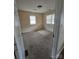 Bedroom featuring carpet flooring, natural light, and an open doorway at 1806 Little Rock Rd, Charlotte, NC 28214