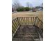 View from the front porch showcasing the wood railings and the neighborhood beyond at 1806 Little Rock Rd, Charlotte, NC 28214