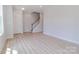 Bright, open-concept living space with beautiful flooring and natural light at 210 Gilead Rd, Huntersville, NC 28078