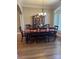 Formal dining room with wood table, chandelier, and ample seating for eight at 2379 Metcalf Dr, Sherrills Ford, NC 28673