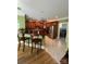 Stylish kitchen featuring dark cabinetry, stainless steel appliances, and breakfast bar at 2379 Metcalf Dr, Sherrills Ford, NC 28673