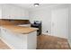 Kitchen features white cabinets and countertops, a stainless steel sink, and stainless steel appliances at 2407 Moose Rd, Kannapolis, NC 28083