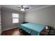 Simple bedroom featuring hardwood floors, natural light, and a minimalist aesthetic at 3272 Hunter Ridge Rd, Rock Hill, SC 29732