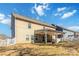 Back of the home with covered patio at 3960 Franklin Meadows Dr, Matthews, NC 28105