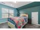 Comfortable bedroom featuring a bright window and neutral color scheme at 3960 Franklin Meadows Dr, Matthews, NC 28105