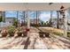 Covered outdoor patio with ceiling fan at 3960 Franklin Meadows Dr, Matthews, NC 28105