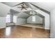 Bonus room with hardwood flooring and windows, perfect for versatile living space at 4907 White Oak Ln, Denver, NC 28037