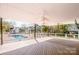 Expansive covered deck overlooking the swimming pool and backyard at 4907 White Oak Ln, Denver, NC 28037