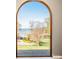 Window view of a lake, trees, and a landscape with yellow flowers at 4907 White Oak Ln, Denver, NC 28037