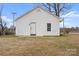 Rear exterior of a home with a lawn, siding, and simple design at 517 S Central Ave, Landis, NC 28088