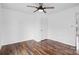 Bedroom with ceiling fan, wood-look flooring, and a view at 517 S Central Ave, Landis, NC 28088