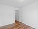 Bright bedroom with wood-look flooring, and a neutral color palette at 517 S Central Ave, Landis, NC 28088