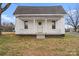 Charming home featuring a quaint front porch with classic architectural details at 517 S Central Ave, Landis, NC 28088