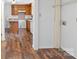 Hallway near kitchen featuring wood-look floors at 517 S Central Ave, Landis, NC 28088