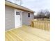 This backyard features a wood deck at 519 N State St, Lincolnton, NC 28092