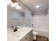 This bathroom features a shower over tub and a vanity with modern fixtures at 519 N State St, Lincolnton, NC 28092