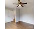 This bedroom features laminate floors, a ceiling fan and a closet at 519 N State St, Lincolnton, NC 28092